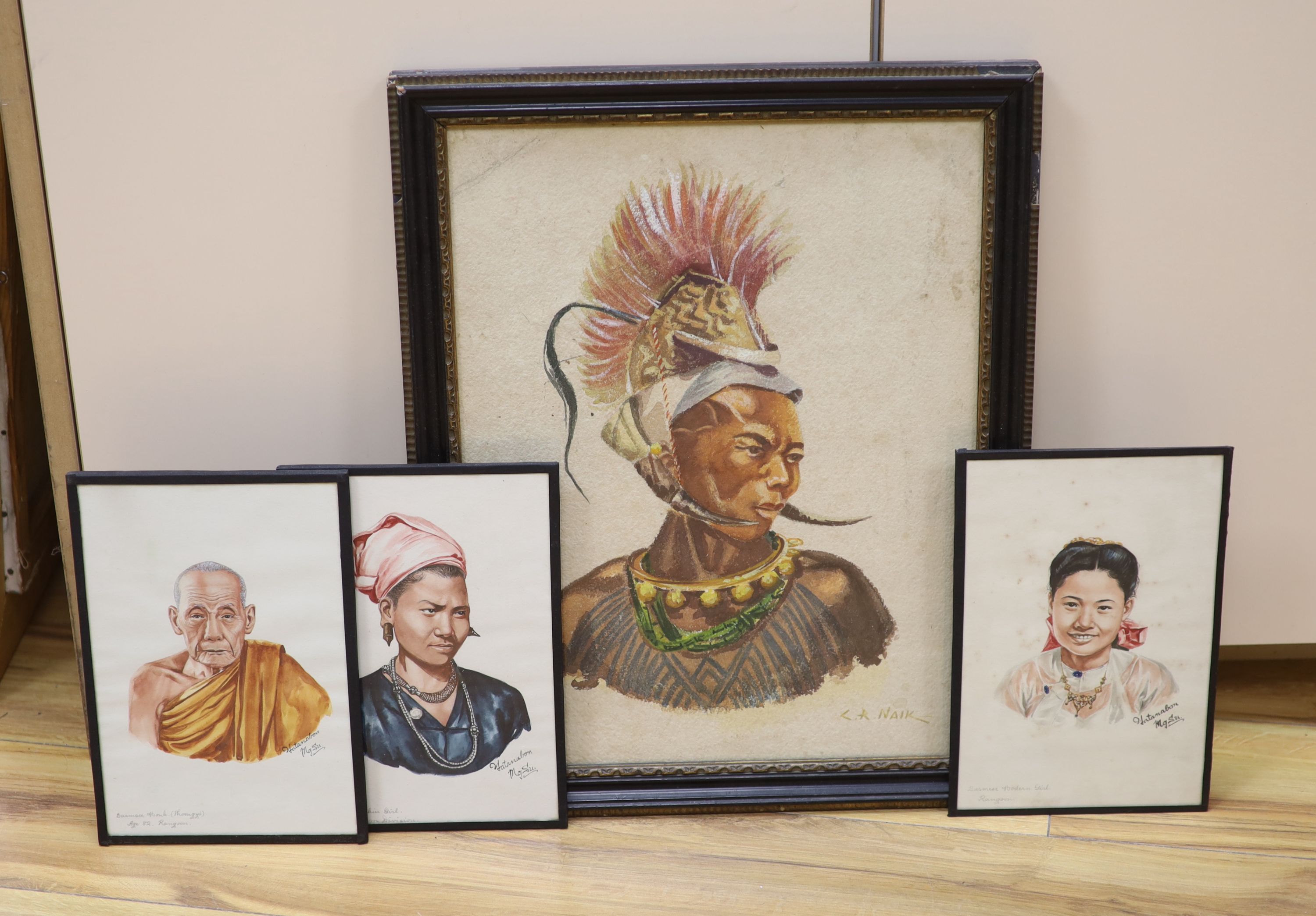 Mgsu Yatanabon, three watercolours, Studies of a Burmese monk, a Kachin girl and another girl, signed, 24 x 16cm and a larger watercolour, signed Naik, 41 x 32cm